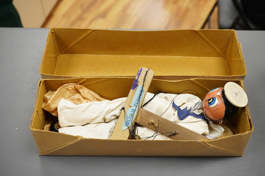 A scarce boxed Pelham Puppet sailor with carved wood cap, ‘Infant Control’